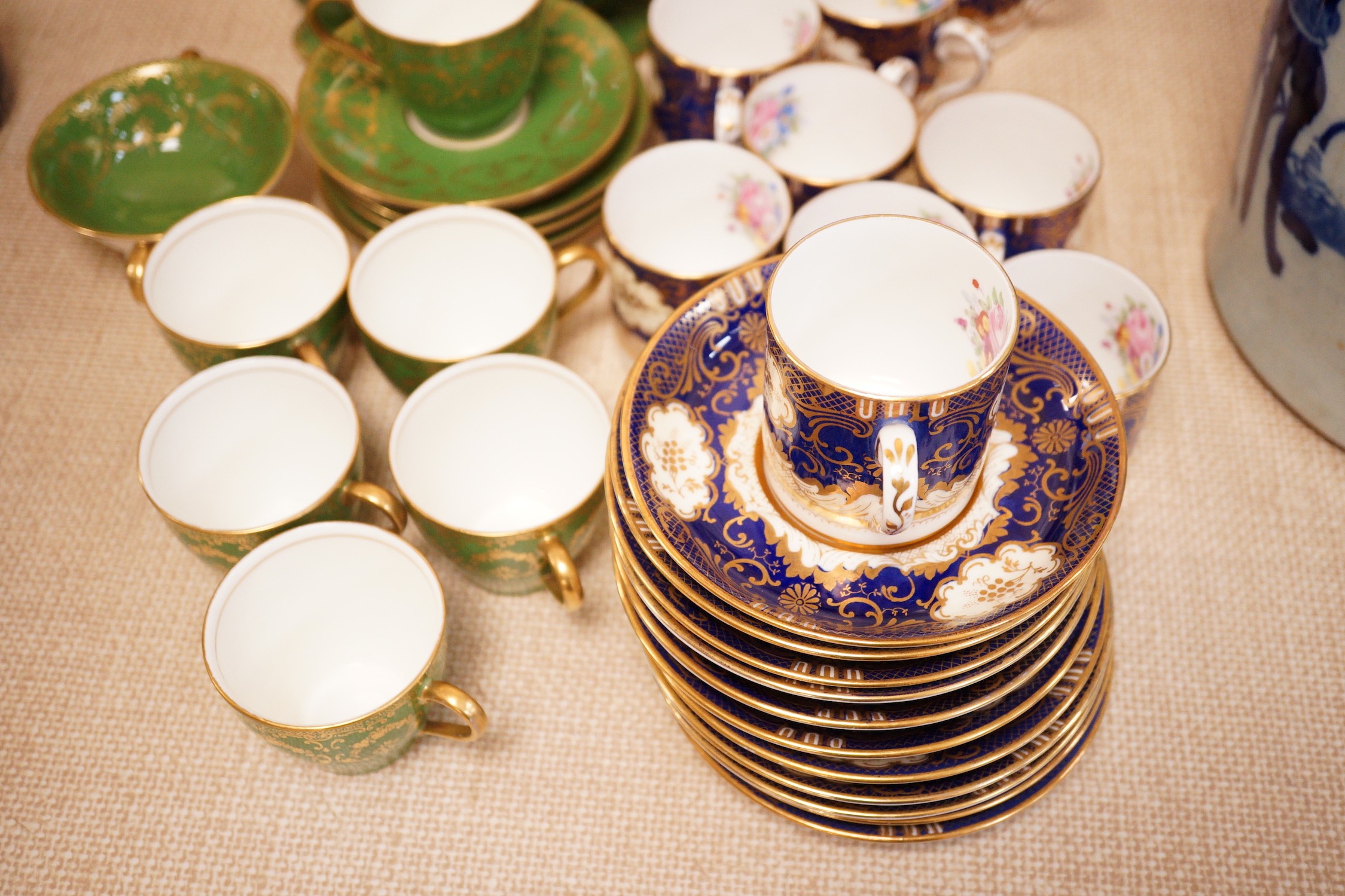 Two bone china coffee sets, Royal Doulton and Staffordshire